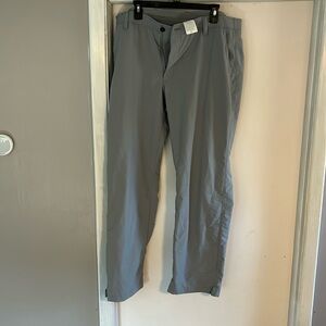 Under armor grey golf pants size 42/32